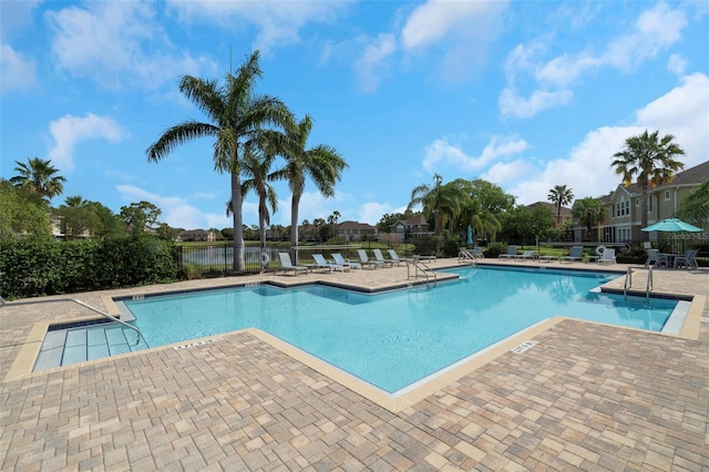 7001 Interbay Blvd Unit 242, Tampa, FL 33616 - community pool featuring a patio and a water view