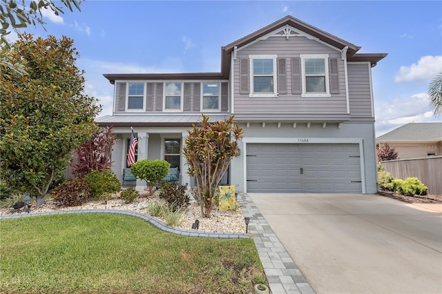 11684 Brighton Knoll Loop, Riverview, FL 33579 - view of front facade with a garage, driveway, and stucco siding