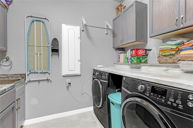 11684 Brighton Knoll Loop, Riverview, FL 33579 - laundry area with washer and dryer, cabinet space, and baseboards