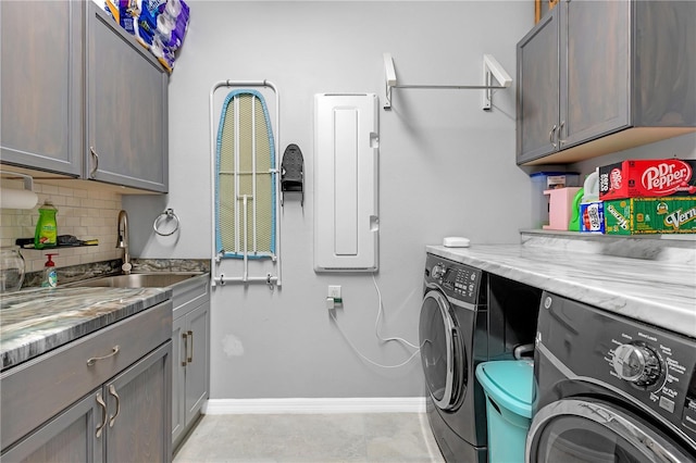 11684 Brighton Knoll Loop, Riverview, FL 33579 - laundry area with washing machine and clothes dryer, baseboards, and cabinet space