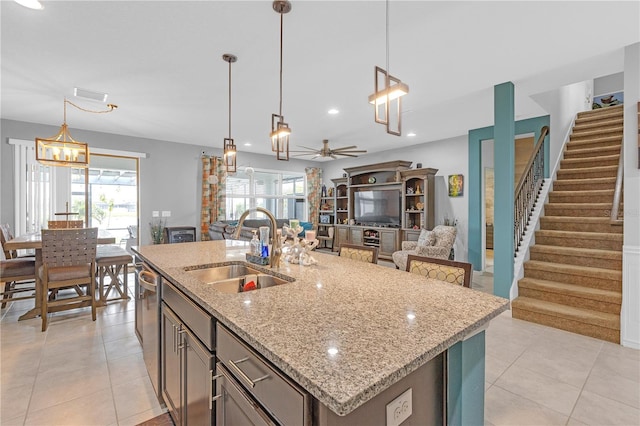 11684 Brighton Knoll Loop, Riverview, FL 33579 - kitchen with a sink, light tile patterned floors, a kitchen island with sink, plenty of natural light, and recessed lighting