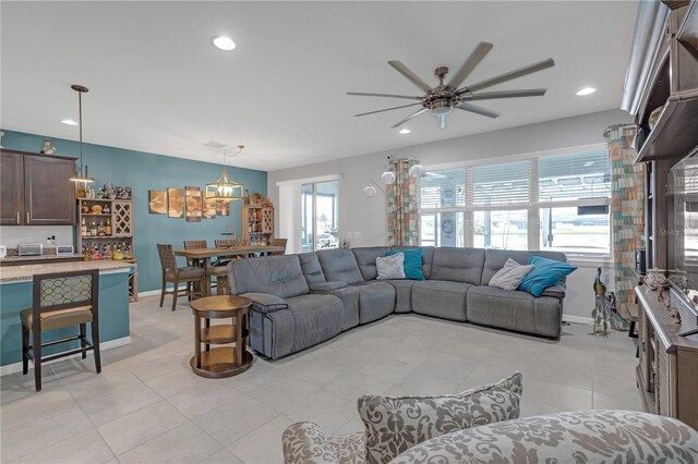 11684 Brighton Knoll Loop, Riverview, FL 33579 - living room with a ceiling fan, baseboards, recessed lighting, and light tile patterned flooring