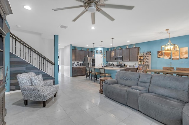 11684 Brighton Knoll Loop, Riverview, FL 33579 - living room with ceiling fan, stairs, and recessed lighting