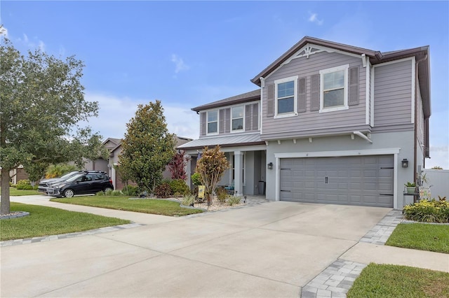 11684 Brighton Knoll Loop, Riverview, FL 33579 - view of front facade featuring an attached garage, driveway, stucco siding, and a front lawn