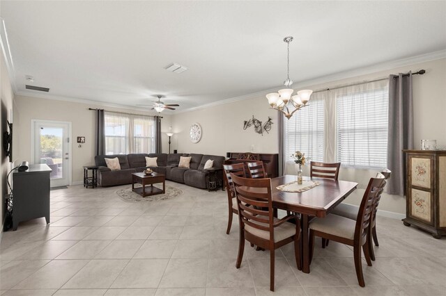 3972 Wisdom Trl, Land O Lakes, FL 34638 - dining room with ornamental molding, a chandelier, a ceiling fan, light tile patterned floors, and baseboards