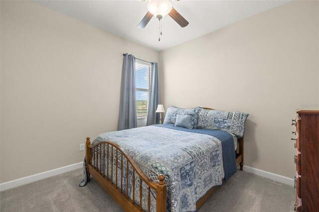 3972 Wisdom Trl, Land O Lakes, FL 34638 - carpeted bedroom with baseboards and a ceiling fan