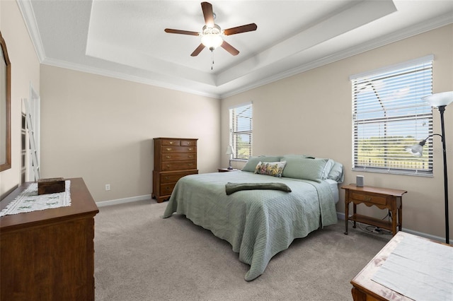 3972 Wisdom Trl, Land O Lakes, FL 34638 - bedroom with a raised ceiling, light colored carpet, crown molding, a ceiling fan, and baseboards