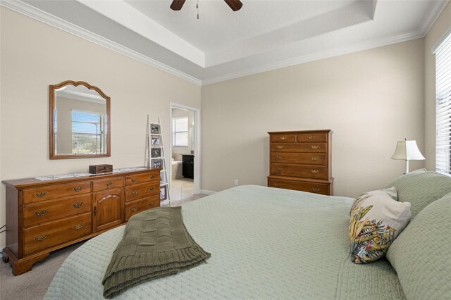 3972 Wisdom Trl, Land O Lakes, FL 34638 - bedroom with a tray ceiling, multiple windows, ornamental molding, ceiling fan, and light carpet