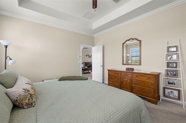 3972 Wisdom Trl, Land O Lakes, FL 34638 - bedroom with light colored carpet, crown molding, a tray ceiling, and ceiling fan