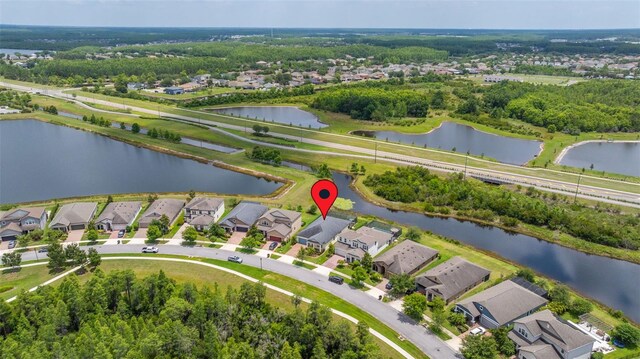 3972 Wisdom Trl, Land O Lakes, FL 34638 - aerial view of property's location featuring a large body of water and nearby suburban area