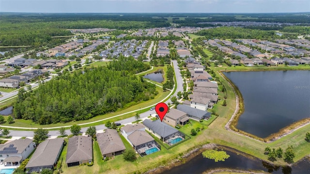 3972 Wisdom Trl, Land O Lakes, FL 34638 - aerial view of property and surrounding area with nearby suburban area and a large body of water