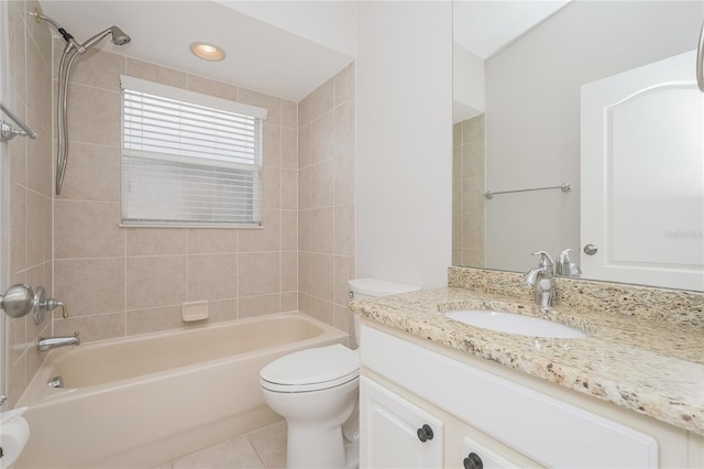 11741 Teapot Ct, Spring Hill, FL 34609 - bathroom with  shower combination, toilet, vanity, and tile patterned floors