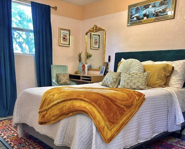 6741 4th Ave N, Saint Petersburg, FL 33710 - bedroom featuring multiple windows and a textured wall