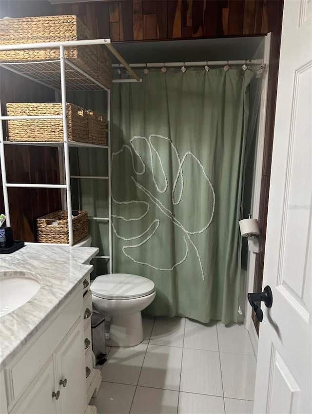 6741 4th Ave N, Saint Petersburg, FL 33710 - bathroom featuring tile patterned floors, toilet, vanity, and curtained shower