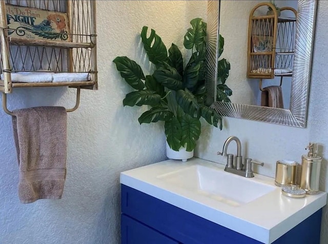 6741 4th Ave N, Saint Petersburg, FL 33710 - bathroom with a textured wall and vanity
