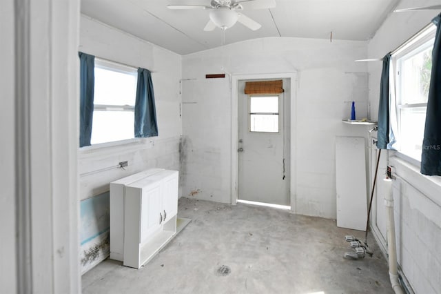 14147 Palm St, Madeira Beach, FL 33708 - entryway with plenty of natural light, concrete floors, and ceiling fan