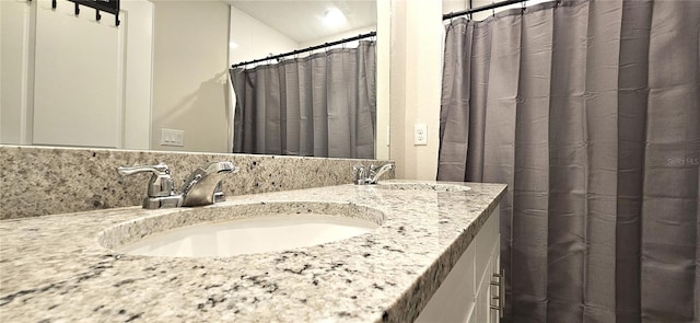 full bathroom with vanity