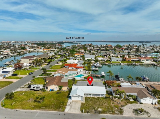 710 116th Ave, Treasure Island, FL 33706 - aerial view of residential area with a nearby body of water