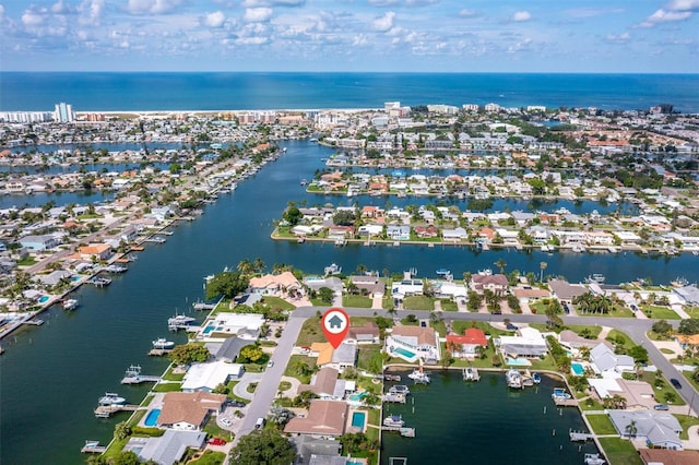 710 116th Ave, Treasure Island, FL 33706 - aerial overview of property's location featuring a large body of water and nearby suburban area