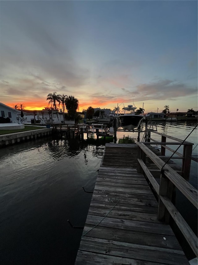 710 116th Ave, Treasure Island, FL 33706 - dock with a water view and boat lift