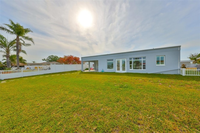 710 116th Ave, Treasure Island, FL 33706 - rear view of house featuring stucco siding