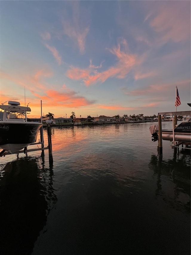 710 116th Ave, Treasure Island, FL 33706 - dock with boat lift and a water view