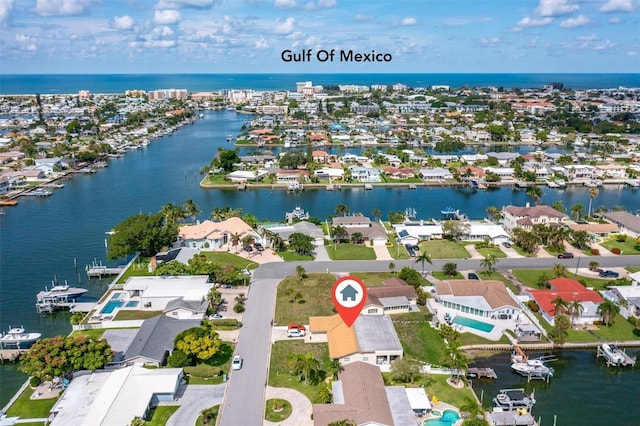 710 116th Ave, Treasure Island, FL 33706 - aerial view of residential area with a large body of water