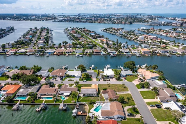 710 116th Ave, Treasure Island, FL 33706 - aerial view of residential area featuring a nearby body of water