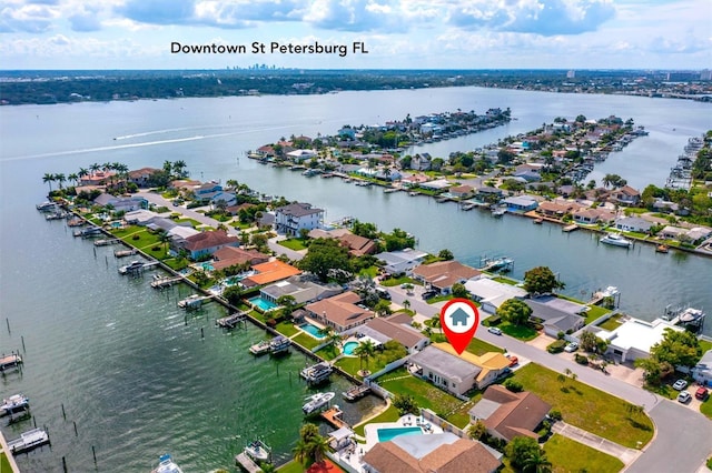 710 116th Ave, Treasure Island, FL 33706 - aerial perspective of suburban area with a large body of water