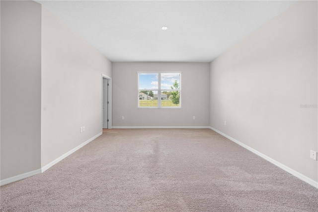 17618 Cortes Creek Blvd, Spring Hill, FL 34610 - empty room featuring light colored carpet and baseboards