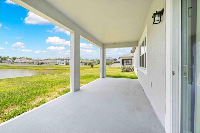17618 Cortes Creek Blvd, Spring Hill, FL 34610 - view of patio featuring a water view and a residential view