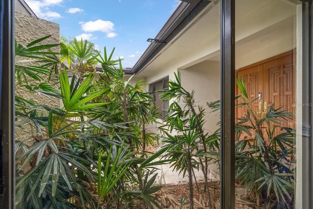14175 Feather Sound Dr, Clearwater, FL 33762 - view of side of property with stucco siding