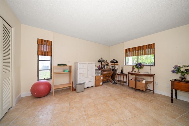 14175 Feather Sound Dr, Clearwater, FL 33762 - office area featuring light tile patterned floors and baseboards