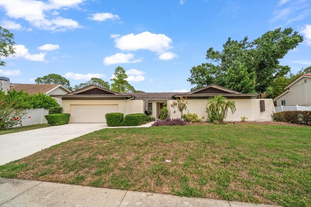 14175 Feather Sound Dr, Clearwater, FL 33762 - single story home featuring a garage, concrete driveway, and stucco siding