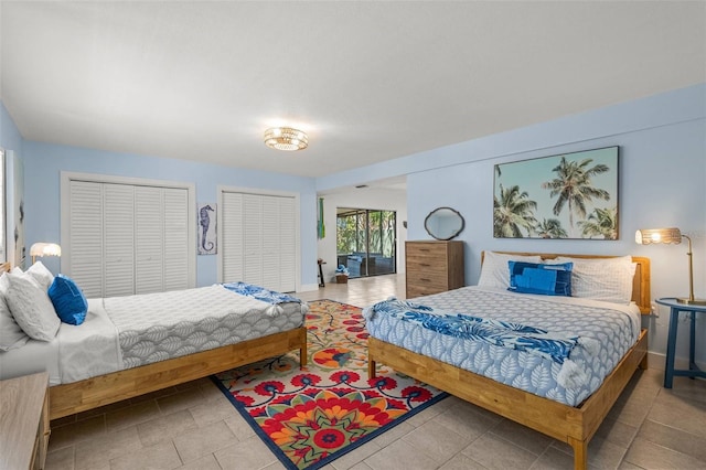1210 Bay Pine Blvd, Indian Rocks Beach, FL 33785 - bedroom featuring multiple closets and baseboards