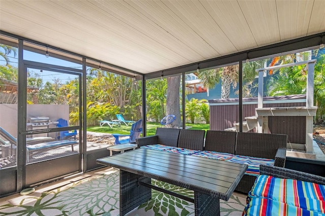 1210 Bay Pine Blvd, Indian Rocks Beach, FL 33785 - sunroom / solarium with an outdoor living space