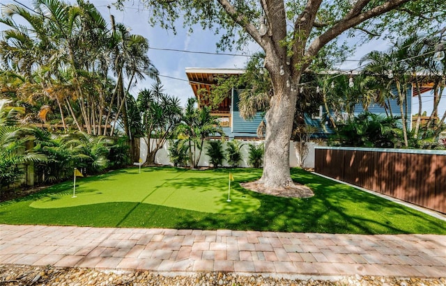 1210 Bay Pine Blvd, Indian Rocks Beach, FL 33785 - fenced backyard featuring an area to practice putting