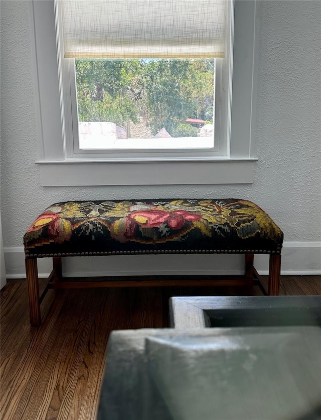 1020 38th Ave N, Saint Petersburg, FL 33704 - sitting room with plenty of natural light, baseboards, wood finished floors, and a textured wall