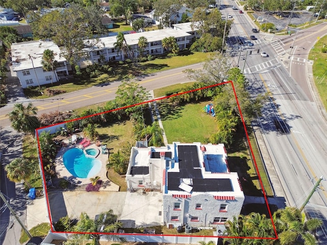 1020 38th Ave N, Saint Petersburg, FL 33704 - aerial view of property and surrounding area featuring property boundaries highlighted and a pool