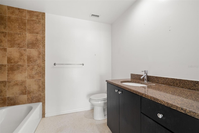 3932 Shore Acres Blvd NE, Saint Petersburg, FL 33703 - bathroom with toilet, vanity, speckled floor, and baseboards