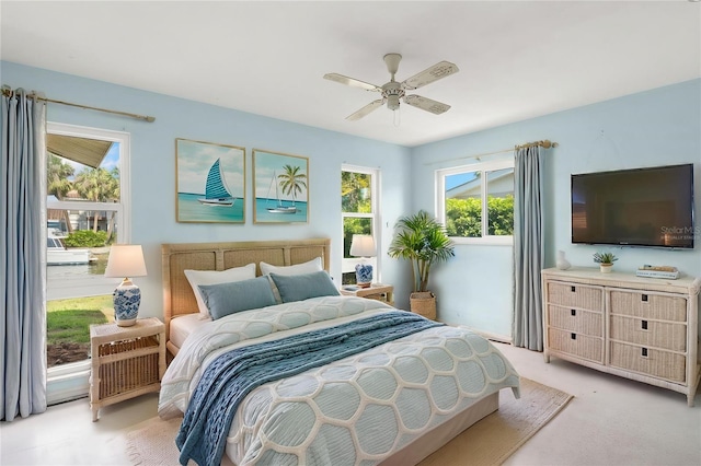 3932 Shore Acres Blvd NE, Saint Petersburg, FL 33703 - bedroom featuring light colored carpet and ceiling fan