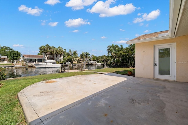 3932 Shore Acres Blvd NE, Saint Petersburg, FL 33703 - view of patio with a water view