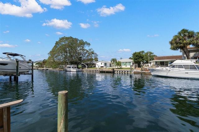 3932 Shore Acres Blvd NE, Saint Petersburg, FL 33703 - dock area with a water view and a residential view
