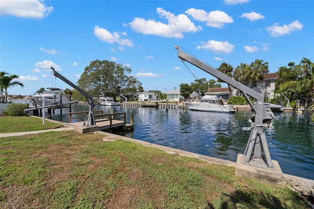 3932 Shore Acres Blvd NE, Saint Petersburg, FL 33703 - dock area with a water view and a yard