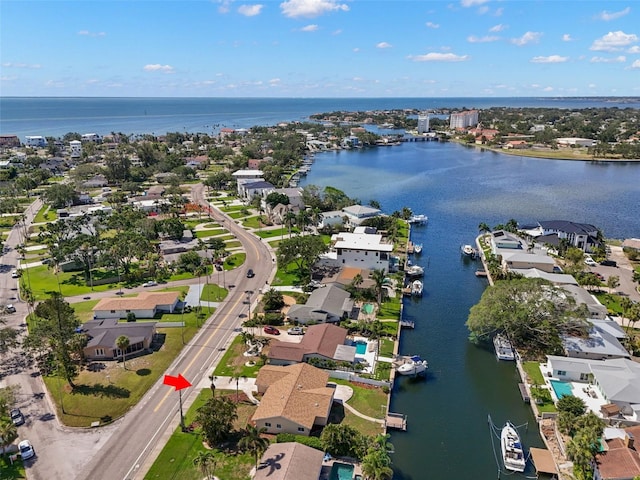 3932 Shore Acres Blvd NE, Saint Petersburg, FL 33703 - aerial perspective of suburban area featuring a large body of water