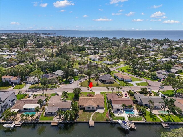 3932 Shore Acres Blvd NE, Saint Petersburg, FL 33703 - aerial view of property and surrounding area with nearby suburban area and a large body of water