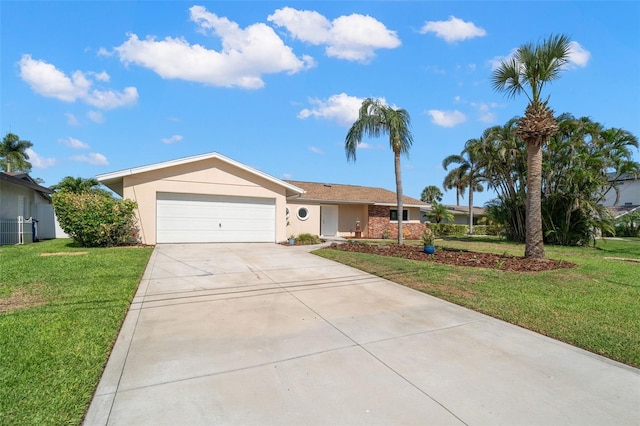 3932 Shore Acres Blvd NE, Saint Petersburg, FL 33703 - ranch-style house featuring driveway, a front lawn, a garage, and stucco siding