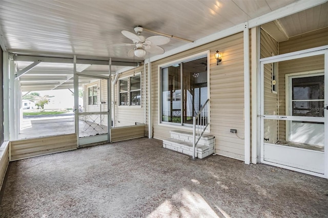 3542 Castle Dr, Zephyrhills, FL 33540 - unfurnished sunroom featuring a ceiling fan and plenty of natural light