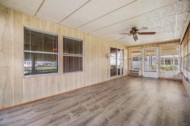 3542 Castle Dr, Zephyrhills, FL 33540 - unfurnished sunroom with ceiling fan