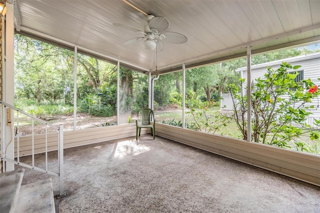 3542 Castle Dr, Zephyrhills, FL 33540 - unfurnished sunroom featuring ceiling fan
